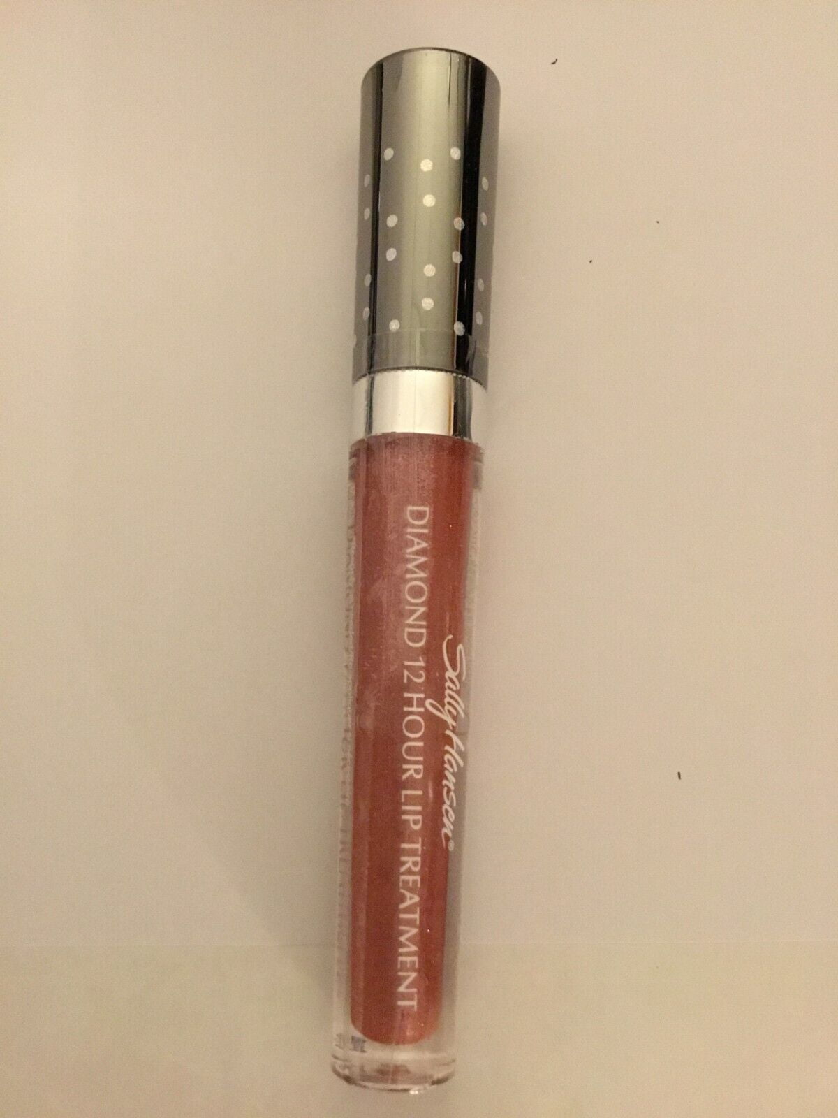 sally hansen vitamin c lip plumper Vita TANGERINE Balm Treatment 6687-15 Clear this lip serum delivers both style and substance Sally Hansen Diamond 12 Hour