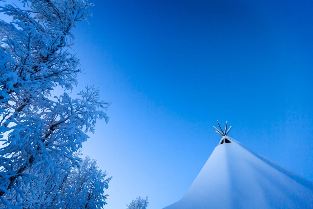 Sami tent and trees in cold winter temperatures of -47 celsius Close to the IceHotel Canvas Art - Panoramic Images (27 x 9)