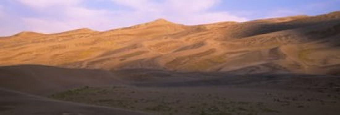 Sand dunes in a desert Great Sand Dunes National Monument Alamosa County Saguache County Colorado USA Canvas Art - Panoramic Images (18 x 7)