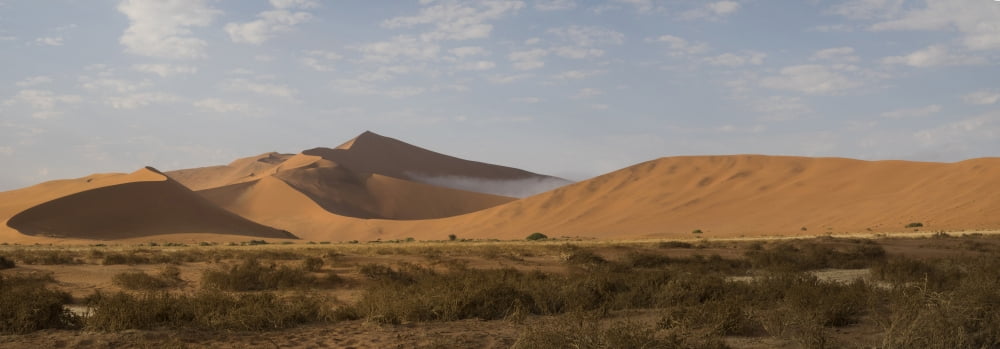 Sand dunes in a desert Sossusvlei Namib-Naukluft National Park Hardap Namibia Canvas Art - Panoramic Images (12 x 36)