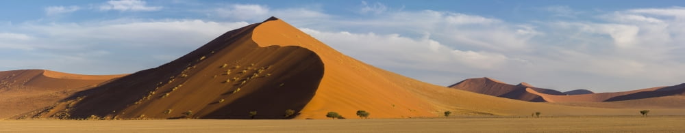 Sand dunes in a desert Sossusvlei Namib-Naukluft National Park Namibia Canvas Art - Panoramic Images (62 x 12)