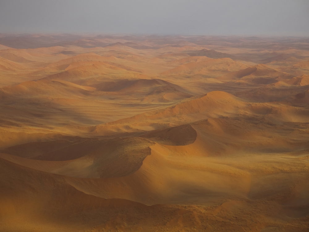 Sand dunes in a desert seen from airplane Sossusvlei Namib-Naukluft National Park Hardap Namibia Canvas Art - Panoramic Images (12 x 16)