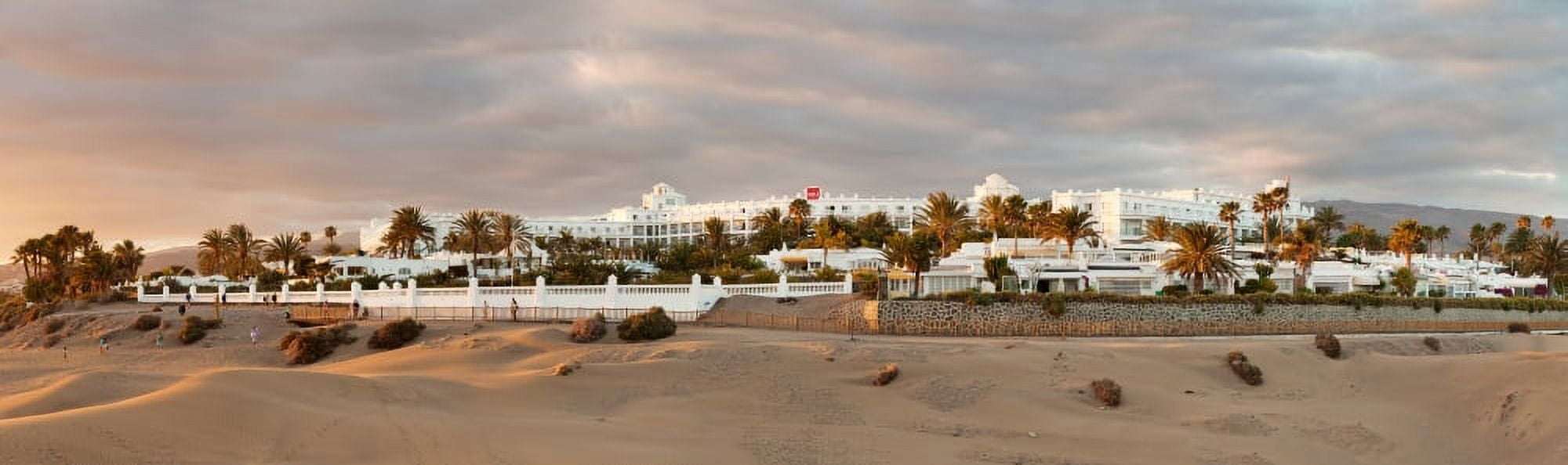 Sand dunes in a desert with a hotel in the background Hotel Riu Palace Maspalomas Grand Canary Spain Canvas Art - Panoramic Images (27 x 9)