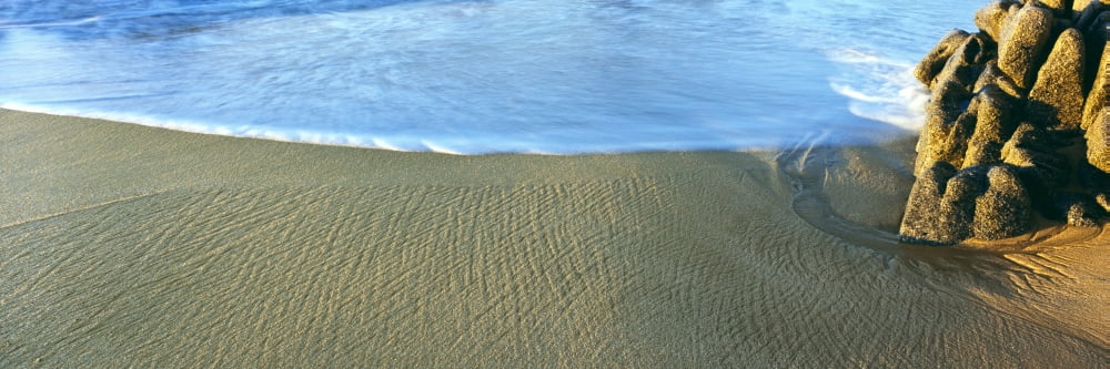 Sand patterns and surf on the beach Lands End Baja California Mexico Canvas Art - Panoramic Images (27 x 9)