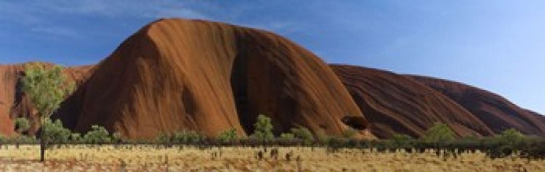 Sandstone rock formations Uluru Northern Territory Australia Canvas Art - Panoramic Images (18 x 6)