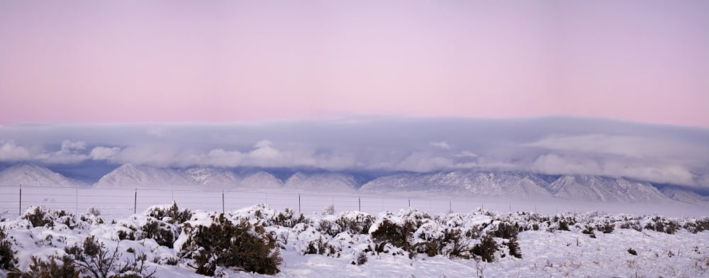 Sangre De Cristo Range with clouds and pink sky seen from NM highway 64 San Luis Valley Colorado USA Canvas Art - Panoramic Images (27 x 9)