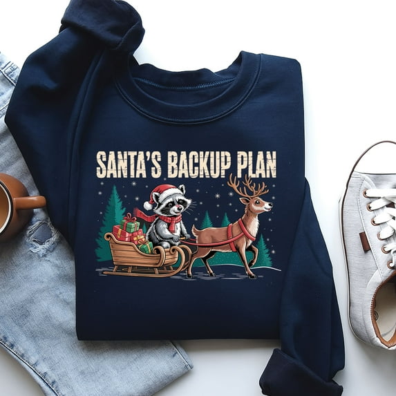 Santa’s Backup Plan Sweatshirt – Raccoon Christmas Sweater, Cute Holiday Crewneck, Funny Animal Lovers Xmas Gift, Cozy Winter Shirt