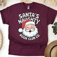 thumbnail image 1 of Santa’s Naughty Book Club Co. Shirt | Funny Reading Holiday Tee, Maroon, Size XL, 1 of 6