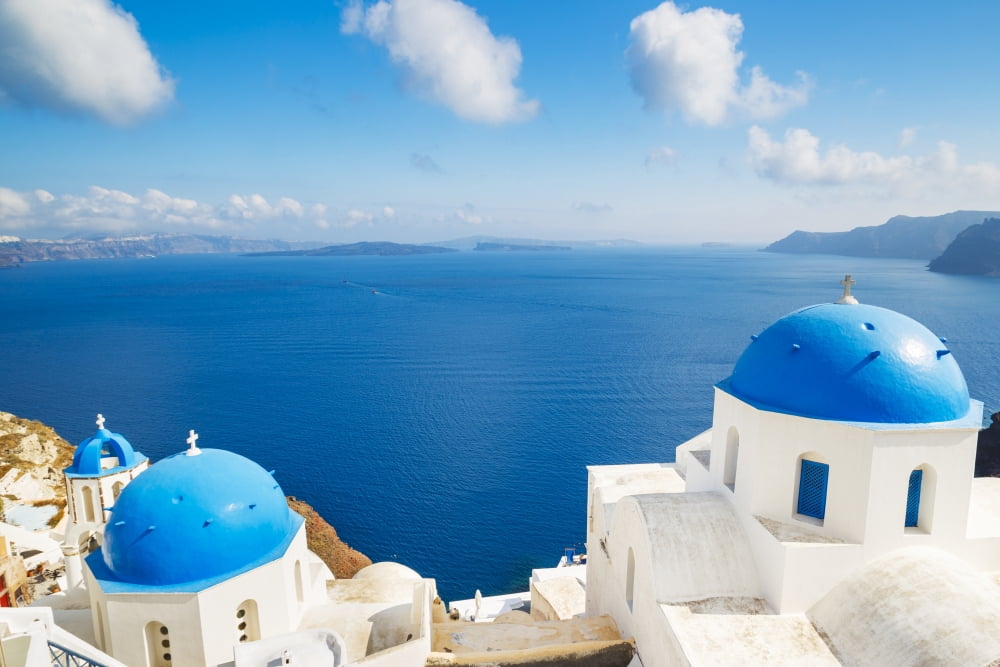 Santorini Island Greece Beautiful View of Blue Ocean and Traditional Dome Church Architecture Canvas Art - Design Pics Vibe Design Pics (34 x 22)