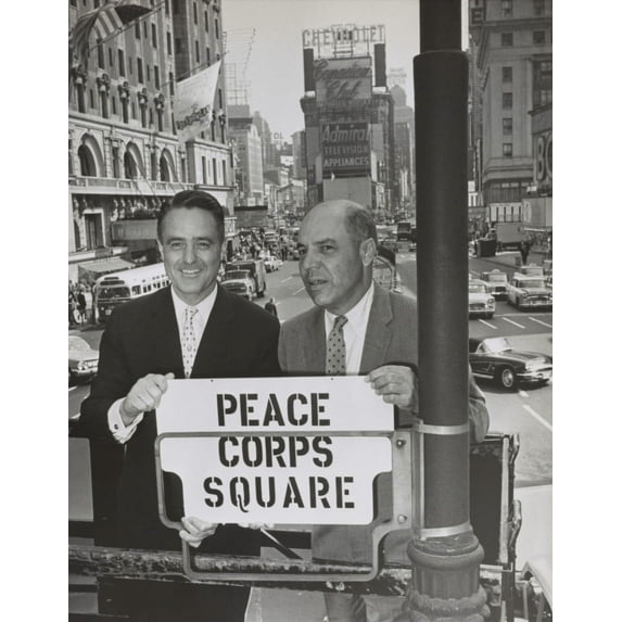 Sargent Shriver And Edward R. Dudley In Times Square With A Sign 'Peace Corps Square'. Shriver Was President Kennedy'S Brother-In-Law And The First Director Of The Peace Corps. Dudley Was Borough