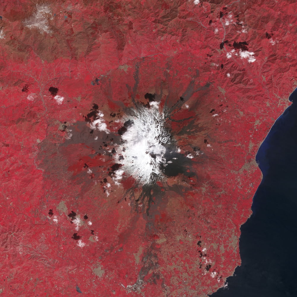 Satellite view of Mount Etna emitting plumes of volcanic gases Canvas Art - Stocktrek Images (28 x 28)