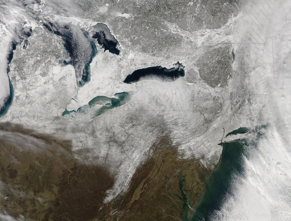 Satellite view of a large Noreaster snow storm over United States Canvas Art - Stocktrek Images (32 x 25)