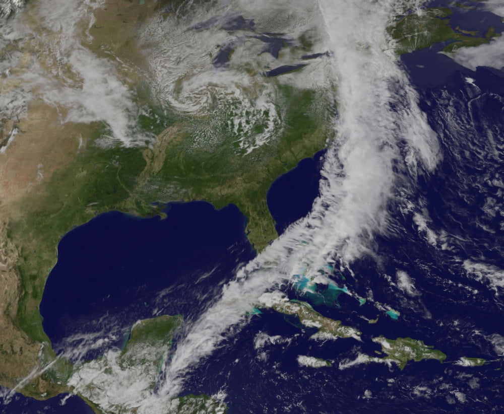 Satellite view of a powerful cold front moving off the United States East Coast Canvas Art - Stocktrek Images (31 x 26)