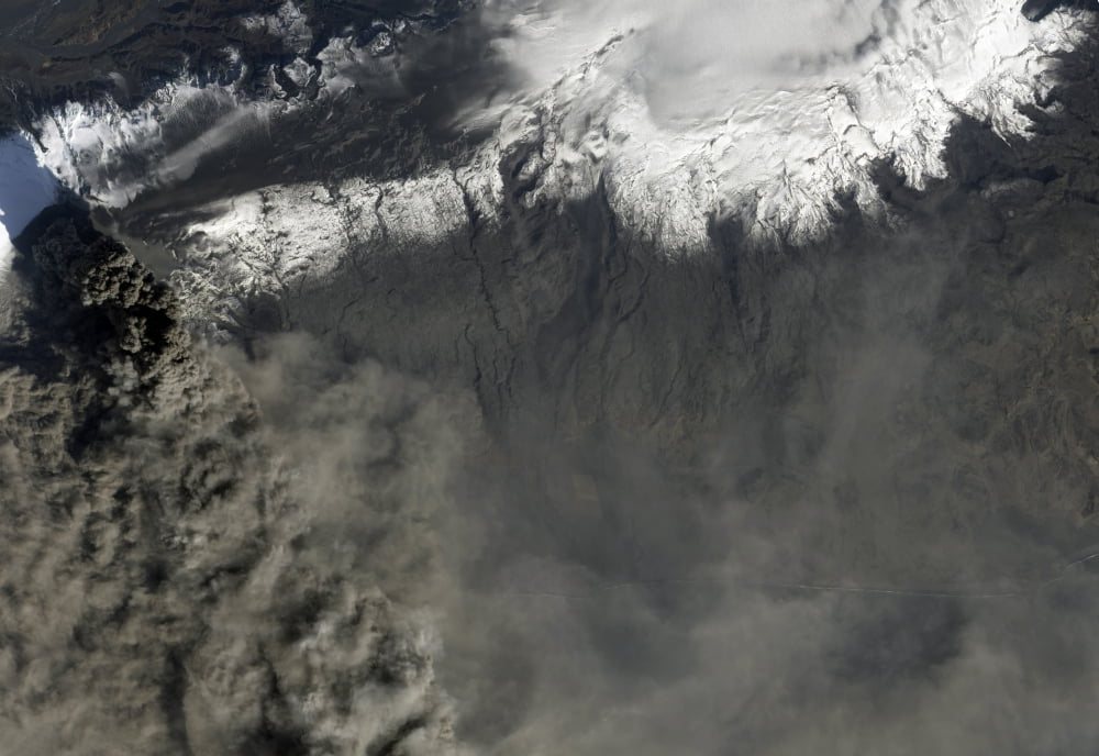 Satellite view of an ash plume rises from Icelands Eyjafjallajokull volcano Canvas Art - Stocktrek Images (34 x 24)