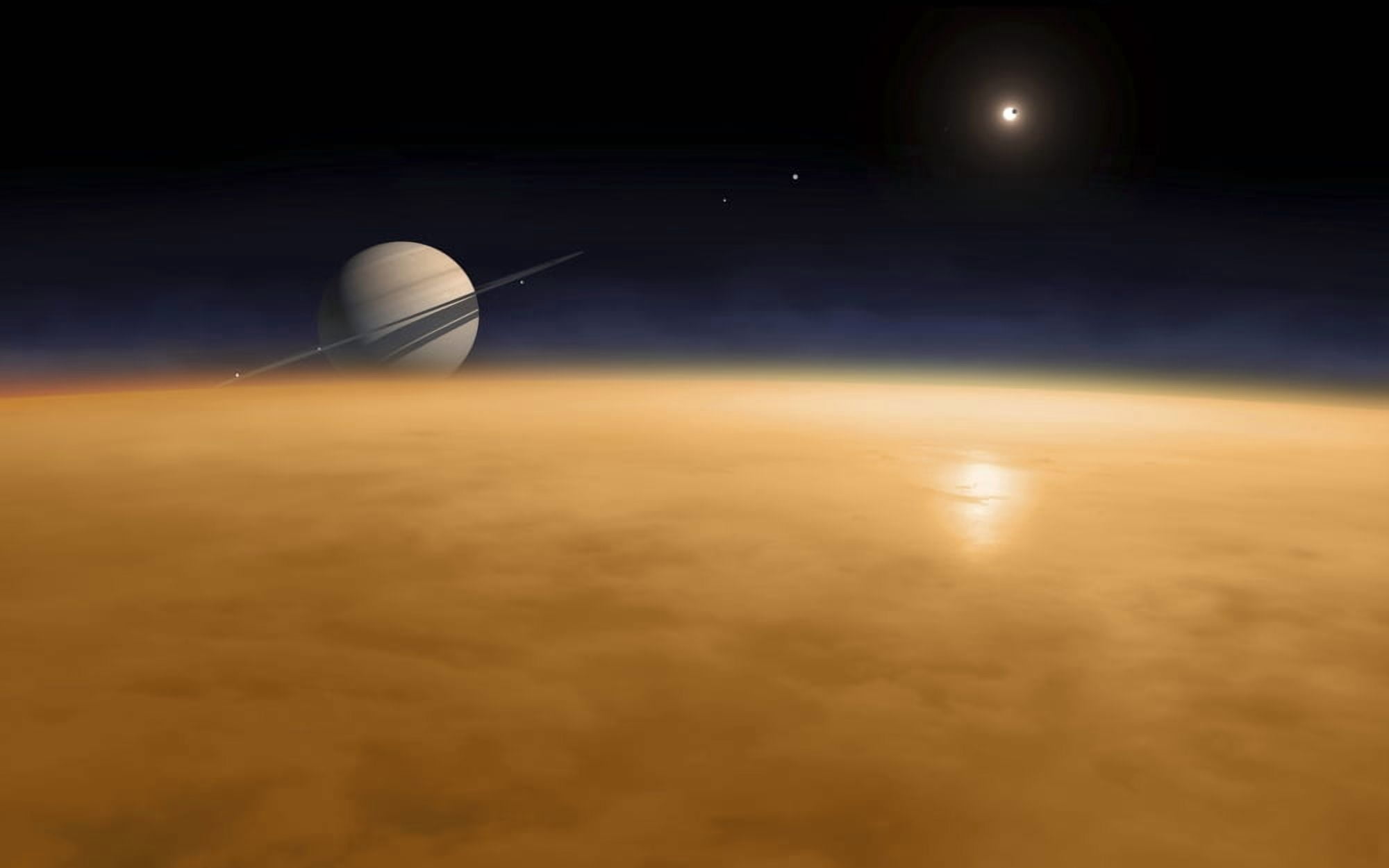 Saturn above the thick atmosphere of its moon Titan Canvas Art - Fahad SulehriaStocktrek Images (36 x 23)