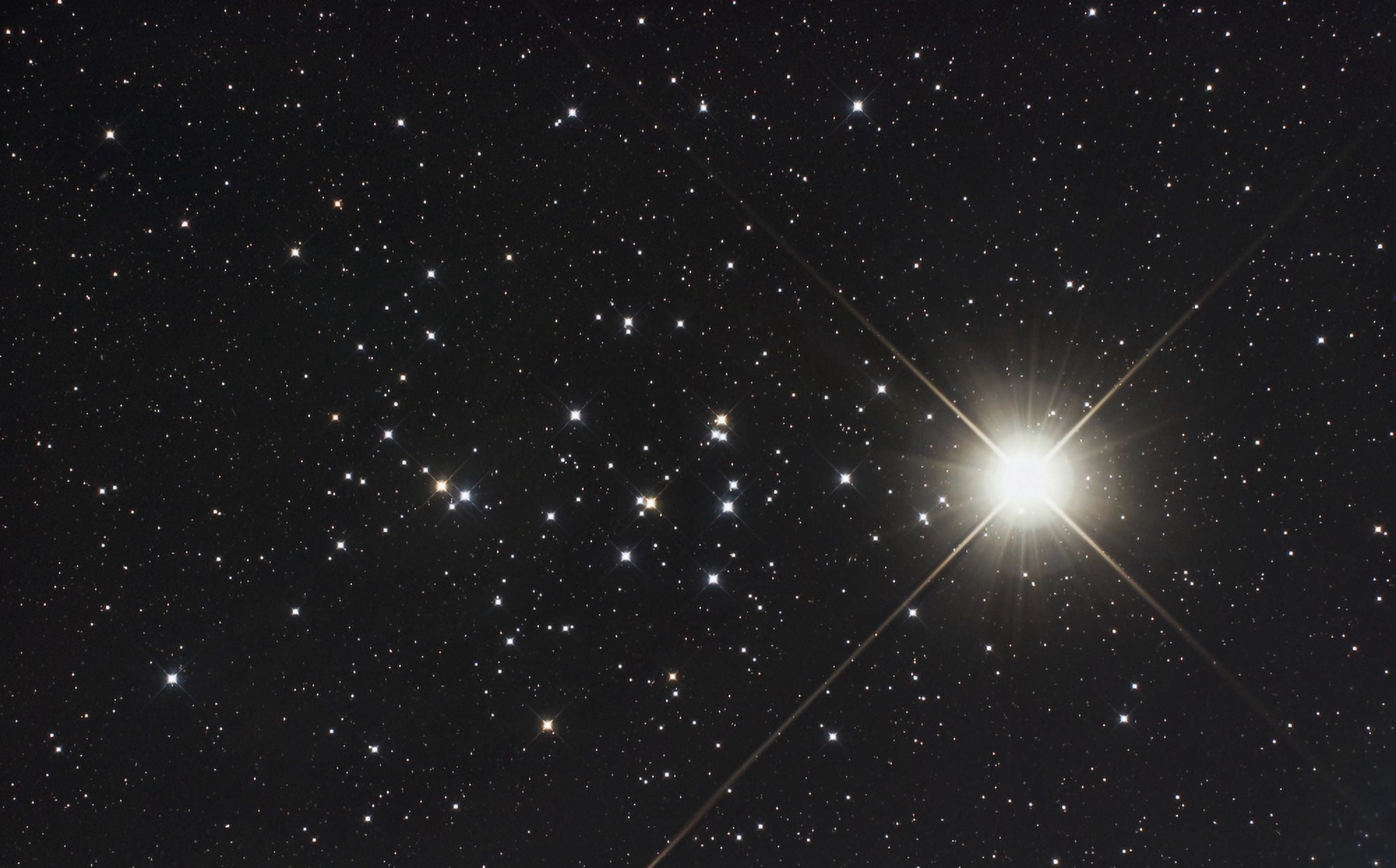 Saturn in the Beehive Star Cluster Canvas Art - Philip HartStocktrek Images (18 x 11)