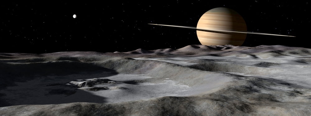 Saturn seen from the surface of its moon Rhea Canvas Art - Ron MillerStocktrek Images (23 x 9)