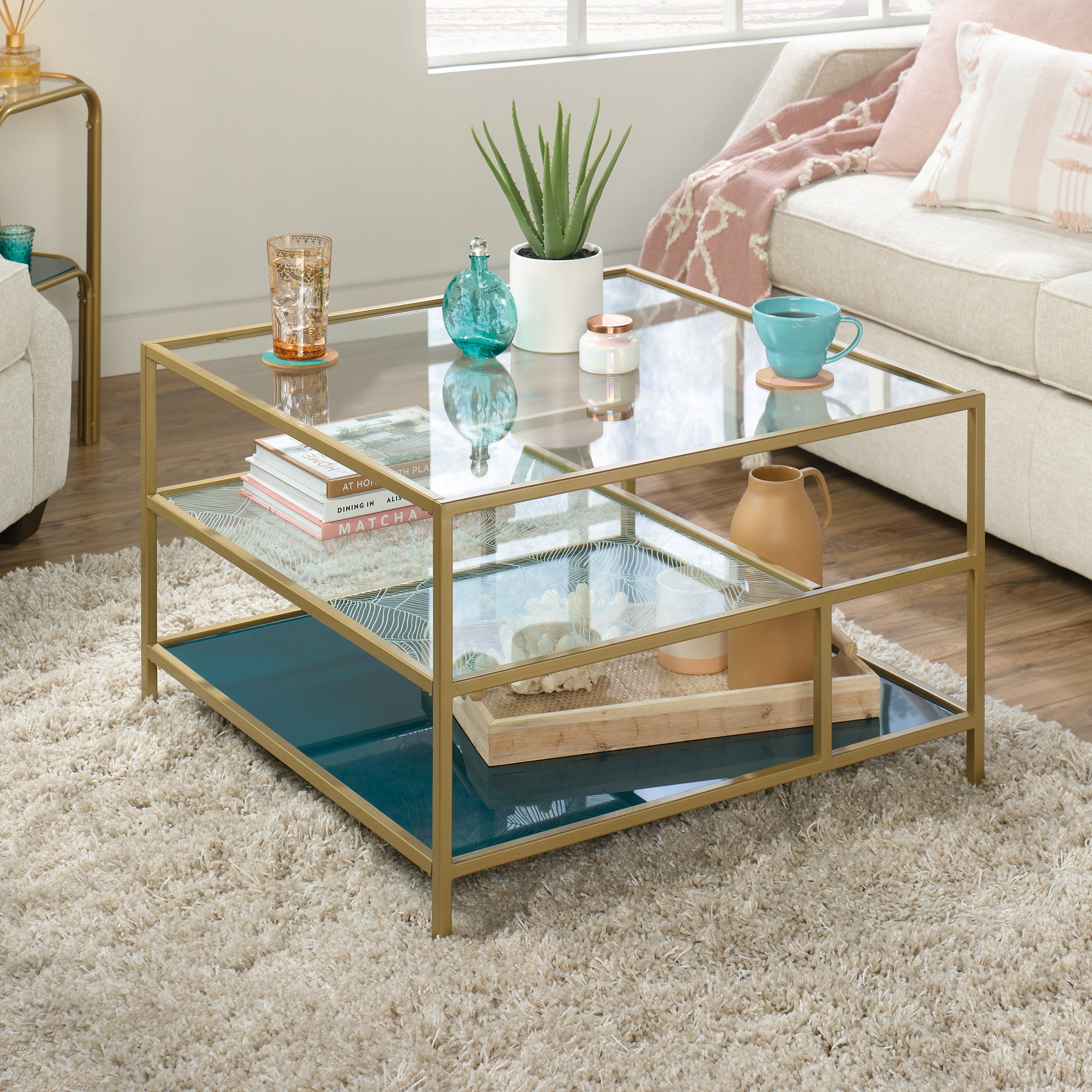 Satin Gold Square Coastal Glass Coffee Table with Abstract Shelves