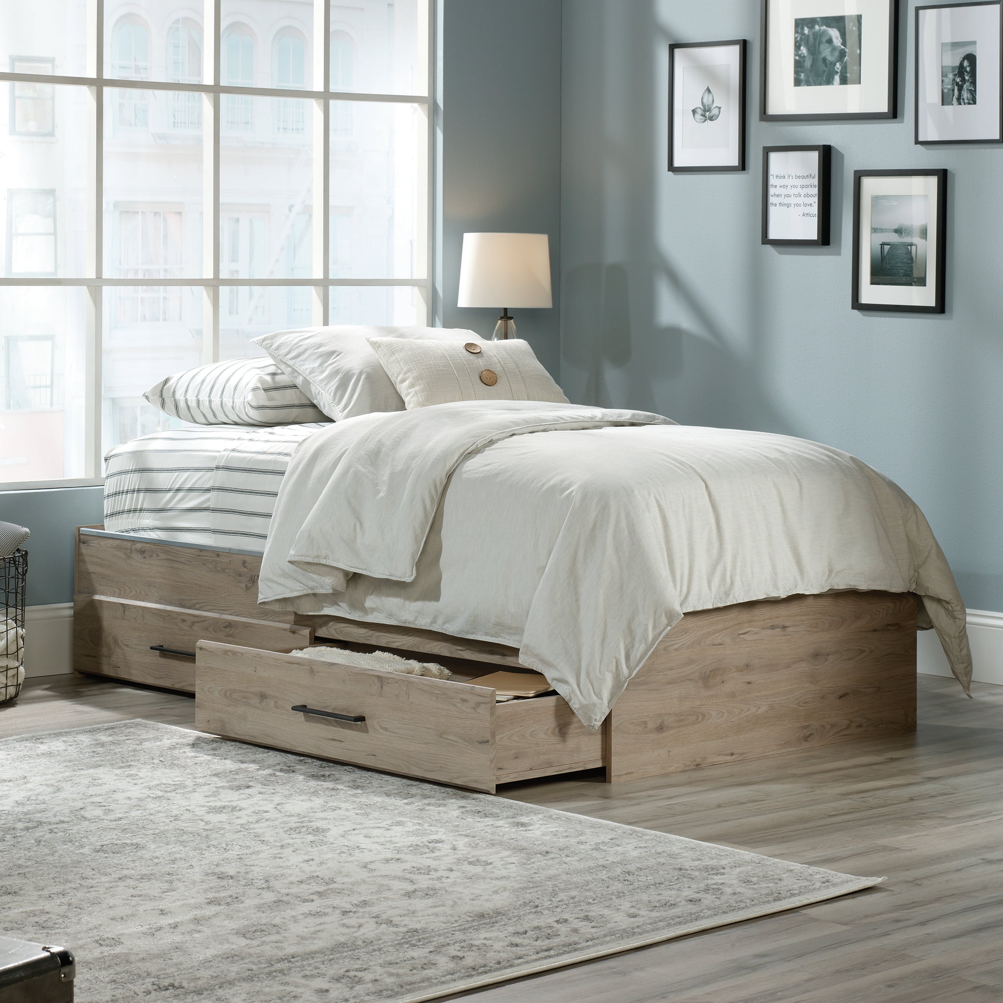 Oak twin bed with storage outlet