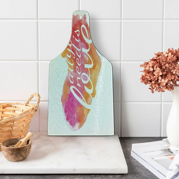 Saying Cutting Board, All You Need is Love Words in Colorful Watercolor Splash Background Art Print, Decorative Tempered Glass Cutting and Serving Board, Wine Bottle Shape, Red Fuchsia, by Ambesonne