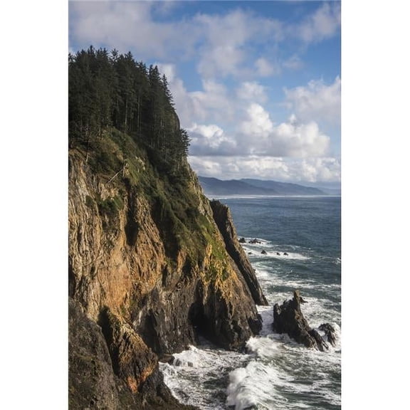 Scattered clouds pass over the Oregon coast; Manzanita Oregon United States of America Poster Print