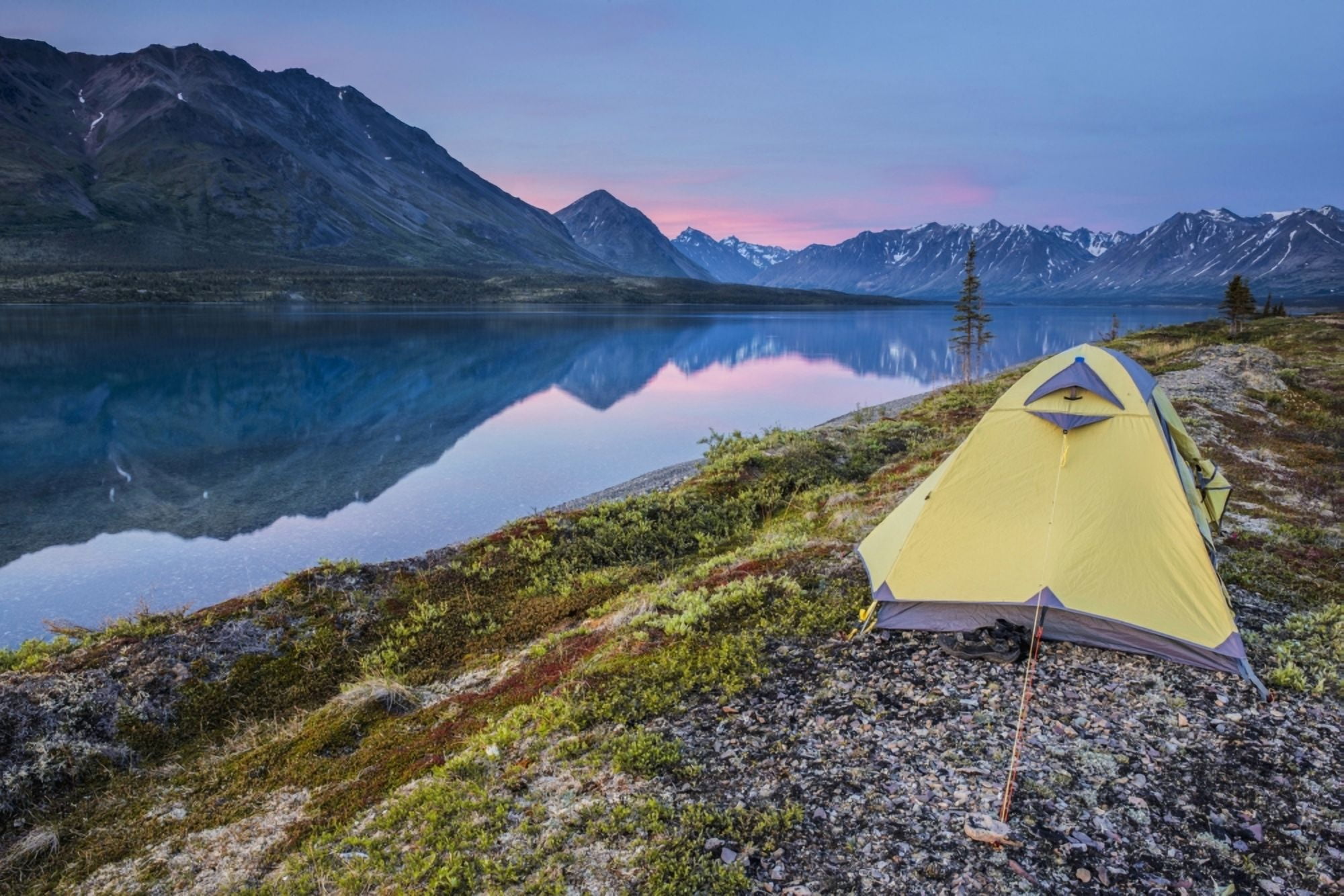 Scenic view of Lower Twin Lake with a backpacking tent in the foreground and sunset Lake Clark National Park & Preserve Southcentral Alaska Canvas Art - Carl Johnson Design Pics (38 x 24)