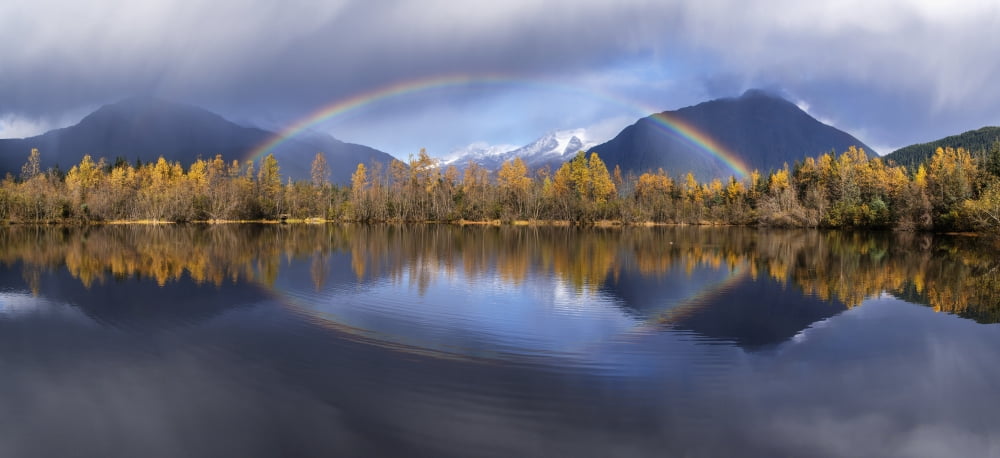 Scenic view of autumn rain showers and a rainbow reflected in Moose Lake Mendenhall Recreation Area Tongass National Forest Juneau Southeast Alaska Canvas Art - John Hyde Design Pics (31 x 14)