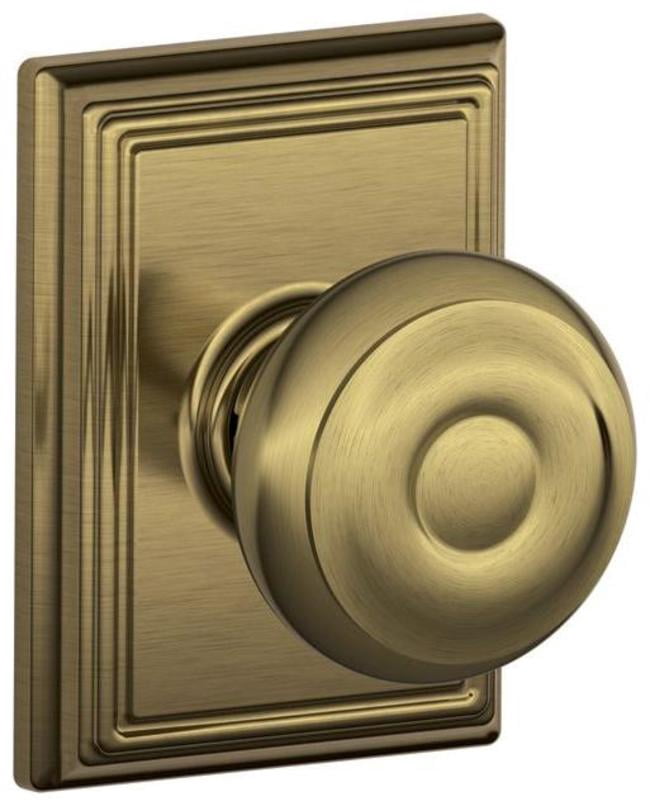 Schlage F10-Geo-Add Georgian Passage Door Knob Set - Brass