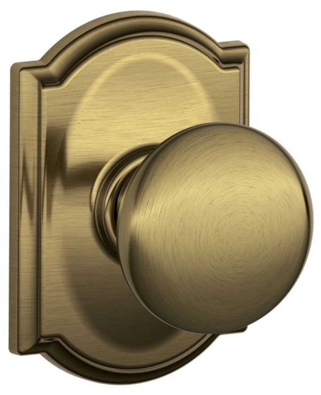 Antique Brass Passage Door Knob with Camelot Rosette