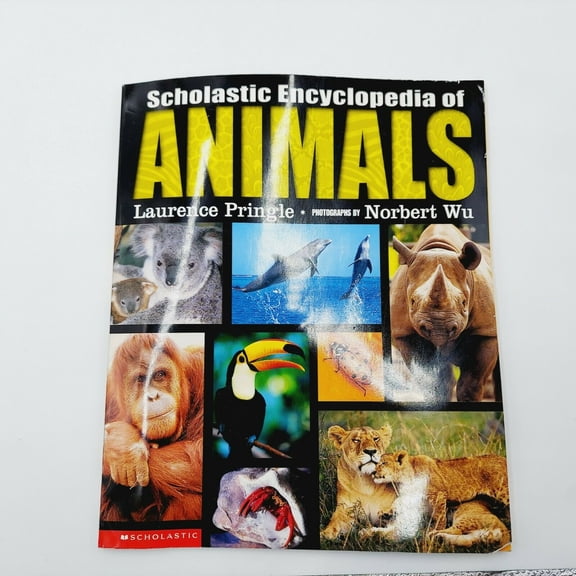 Pre-Owned Scholastic Encyclopedia of Animals (Hardcover) by Laurence P Pringle, Norbert Wu