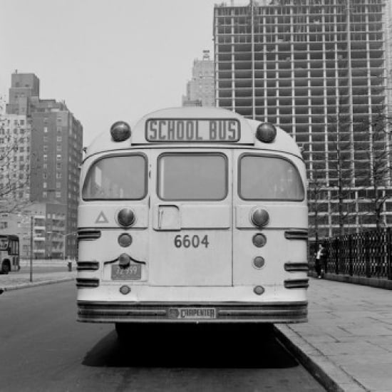 School bus parked on city street Canvas Art - (24 x 36)