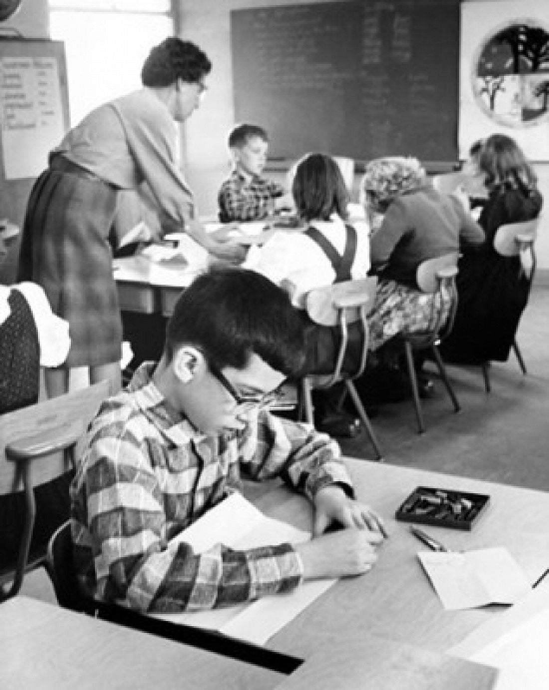 School children in a classroom with a female teacher Canvas Art - (18 x 24)