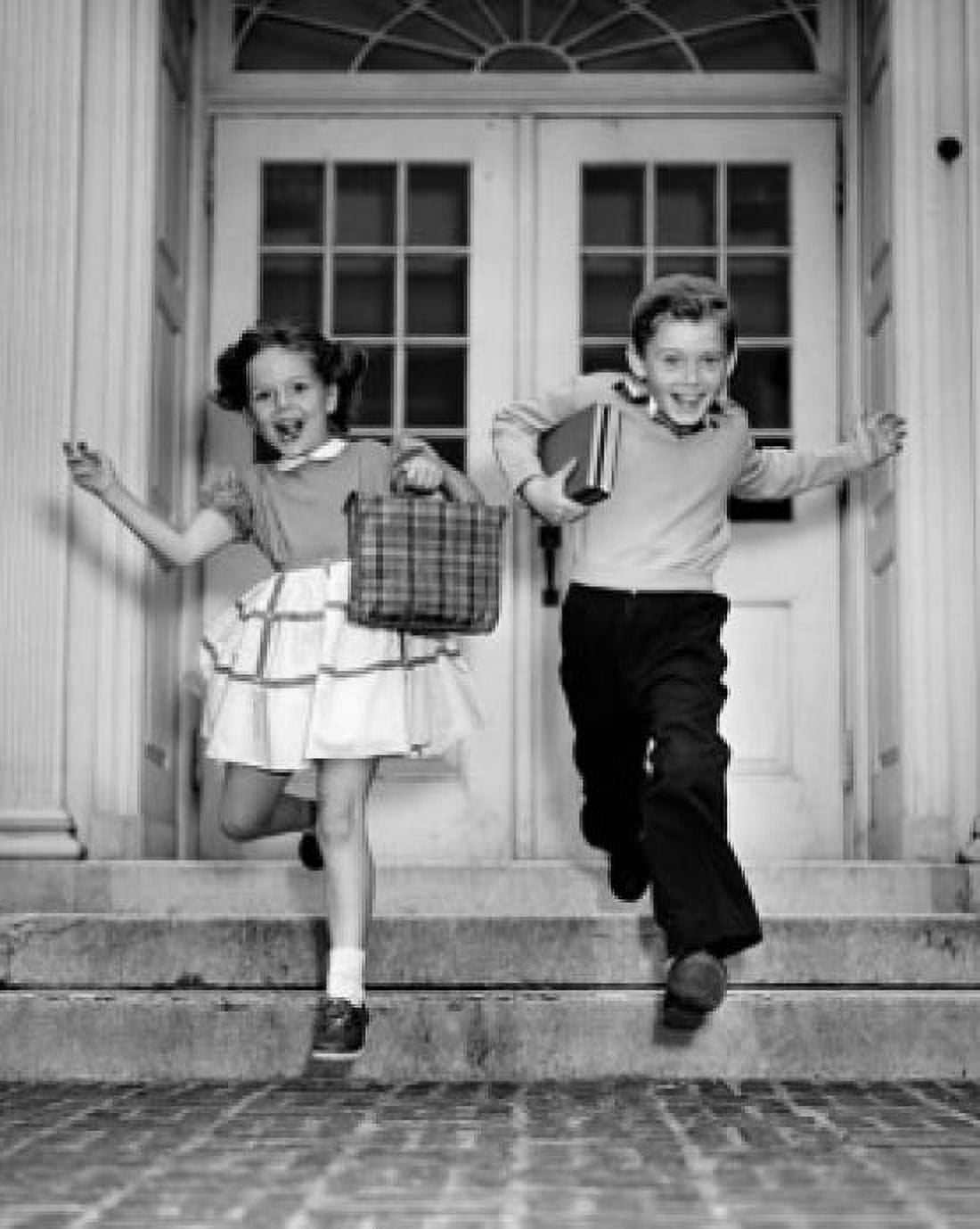 Schoolboy and schoolgirl jumping from steps Canvas Art - (18 x 24)