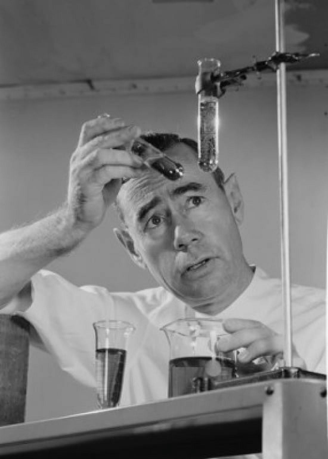 Scientist conducting experiment with test tubes Canvas Art - (18 x 24)