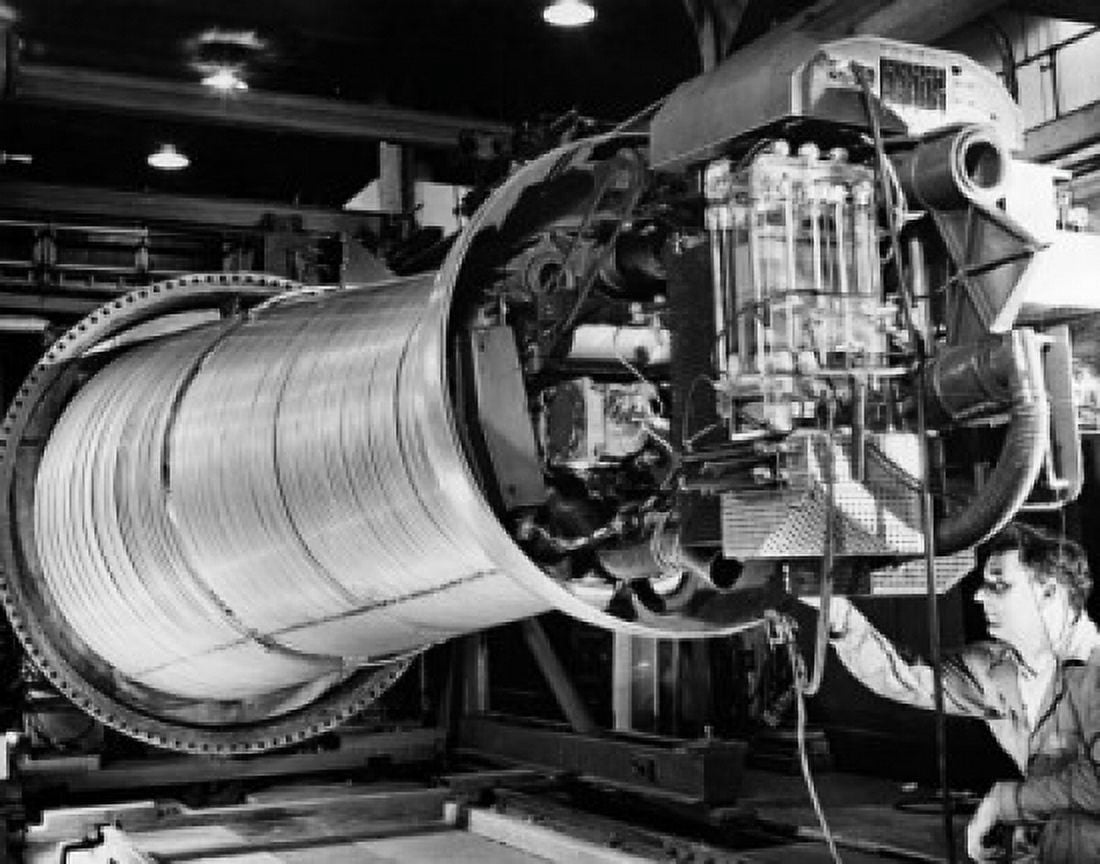 Scientist inspecting a Van de Graaf linear accelerator in a laboratory Lawrence Berkeley National Laboratory University of California Berkeley California USA Canvas Art - (18 x 24)