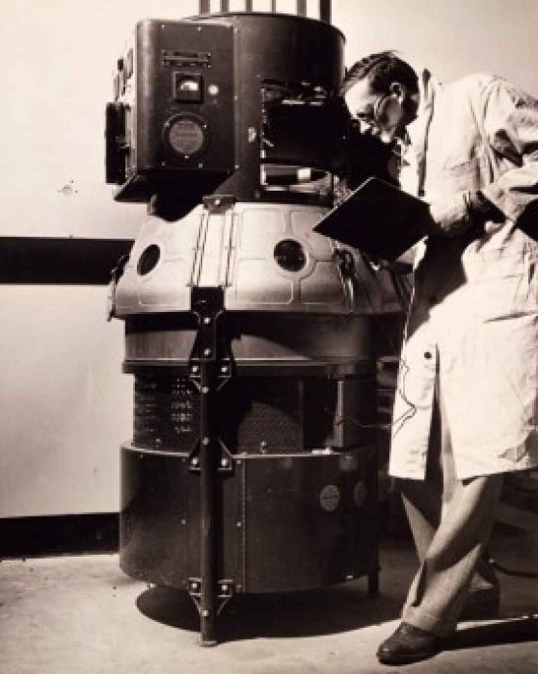 Scientist testing the effects of sunlight on finishes in a measurement laboratory General Electric Company Massachusetts USA Canvas Art - (18 x 24)