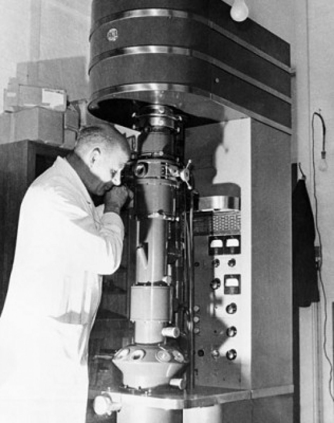Scientist using an electron microscope in a laboratory Cavendish Laboratory Cambridge University Cambridge England Canvas Art - (18 x 24)