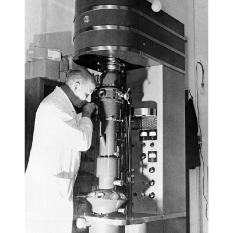 Scientist using an electron microscope in a laboratory, Cavendish Laboratory, Cambridge University, Cambridge, England Poster Print (18 x 24) - Walmart.com