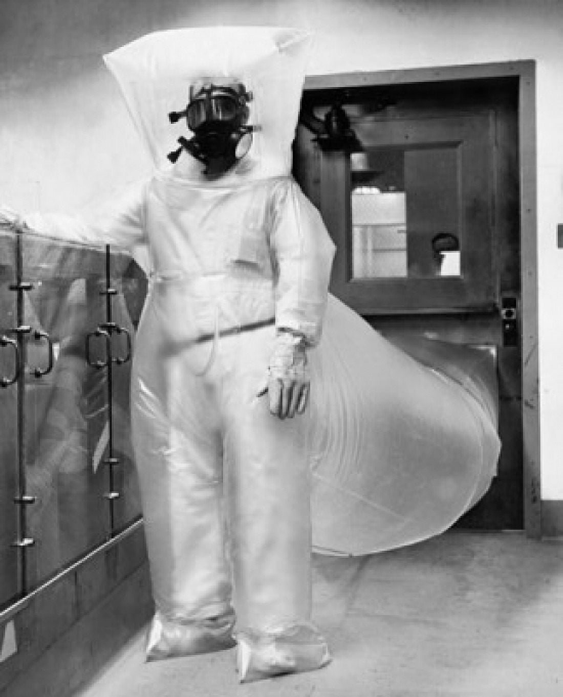 Scientist wearing an atomic suit and standing in a nuclear power station Canvas Art - (24 x 36)