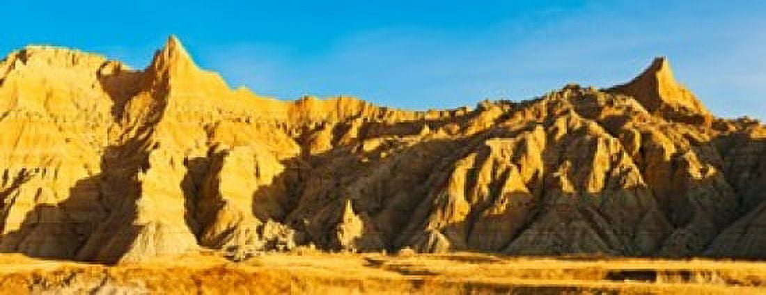Sculpted sandstone spires on a landscape Saddle Pass Trail Badlands National Park South Dakota USA Canvas Art - Panoramic Images (15 x 6)