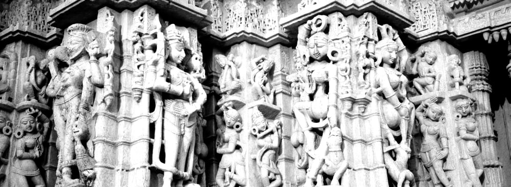 Sculptures carved on a wall of a temple Jain Temple Ranakpur Rajasthan India Canvas Art - Panoramic Images (13 x 36)
