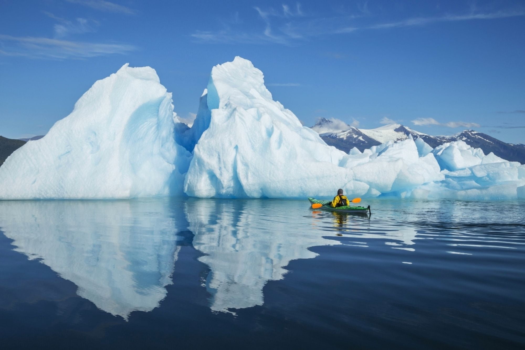 A Sea Kayaker Paddles Beside An Iceberg In Southeast Alaskas Stephens Passage On A Summer Evening Holkham Bay Tracy Arm Mr Ed Emswiler Id#12172012A Canvas Art - John Hyde Design Pics (19 x 12)