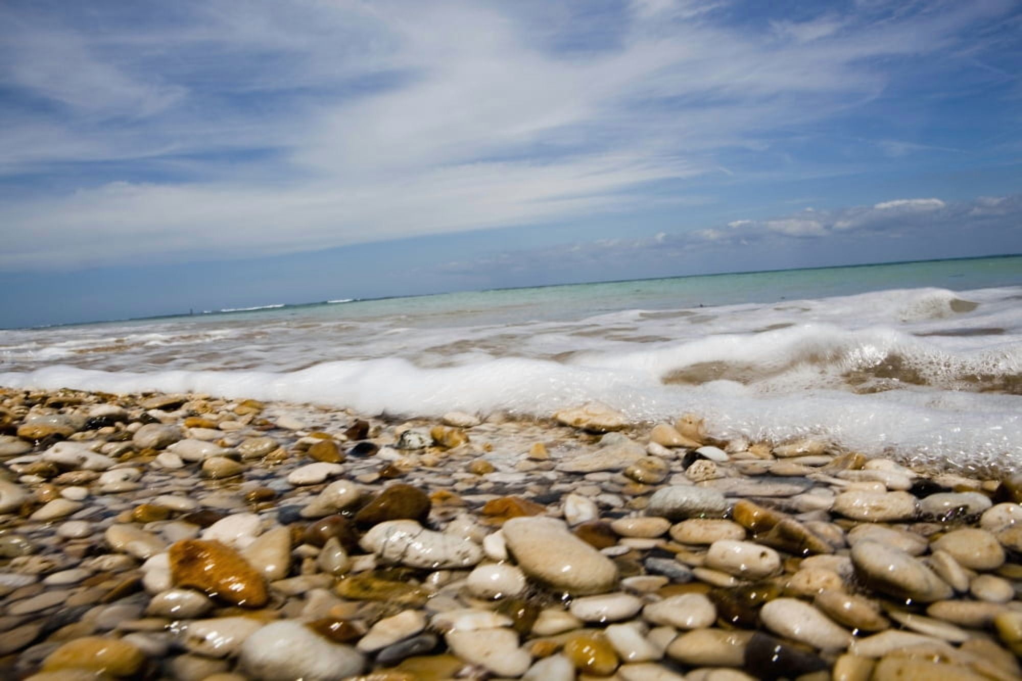 Sea Washing In Onto Sandy Beach Canvas Art - Toby Adamson Design Pics (34 x 22)