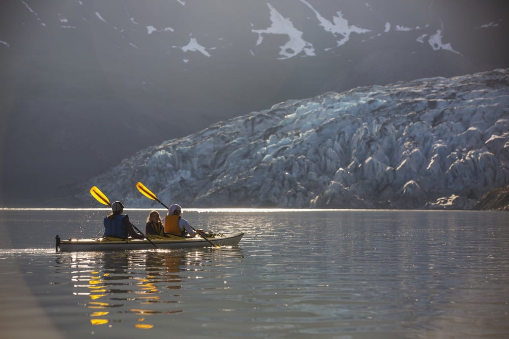 Sea kayakers paddling in evening light at Shoup Bay State Marine Park Prince William Sound Valdez Southcentral Alaska Canvas Art - Kevin Smith Design Pics (38 x 24)