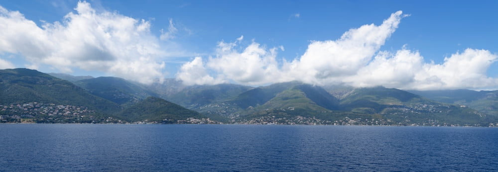 Sea with mountains in the background Bastia Haute-Corse Corsica France Canvas Art - Panoramic Images (12 x 36)