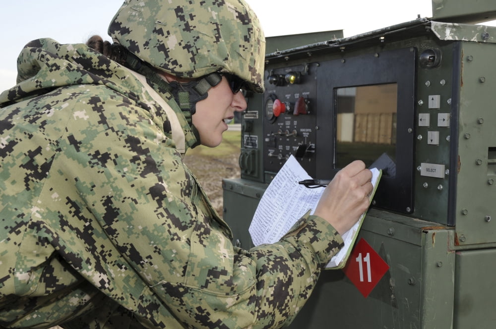 Seabee completes a generator check during a Command Post Exercise Canvas Art - Stocktrek Images (35 x 23)