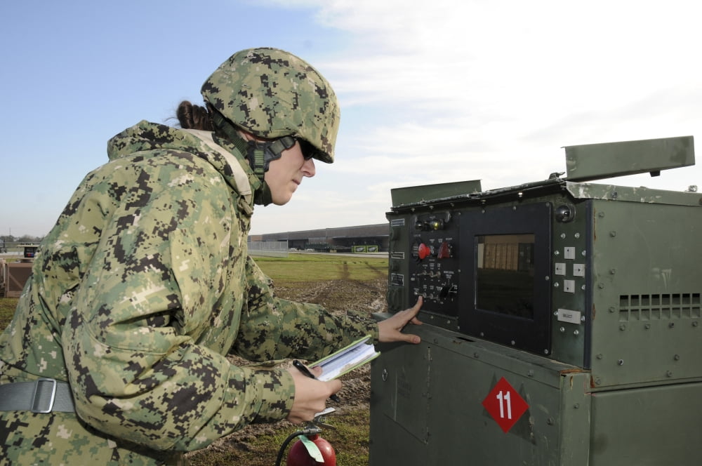 Seabee completes a generator check during a Command Post Exercise Canvas Art - Stocktrek Images (35 x 23)