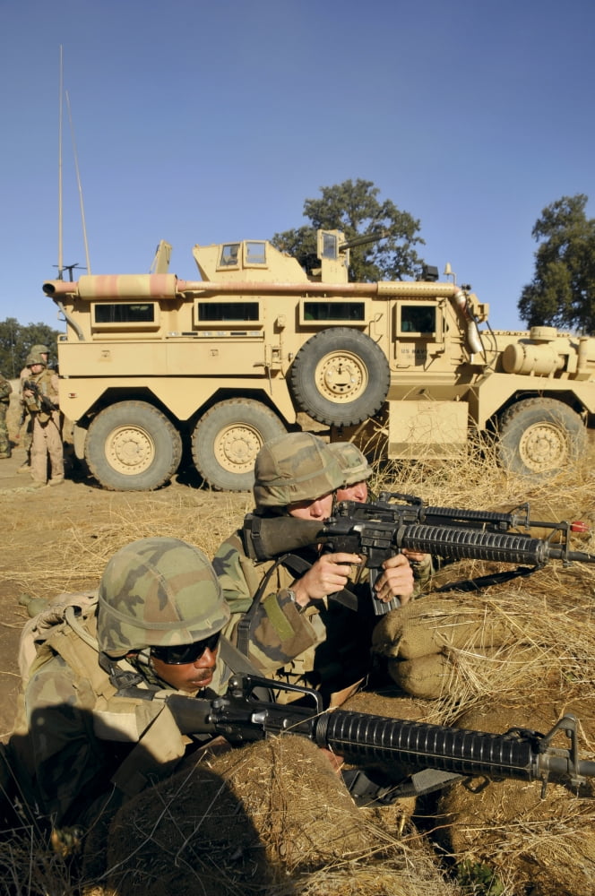 Seabees defend their camp in a simulated firefight at Fort Hunter Liggett California Canvas Art - Stocktrek Images (23 x 35)
