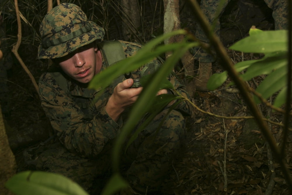 Seaman checks his azimuth while conducting land navigation Canvas Art - Stocktrek Images (34 x 23)