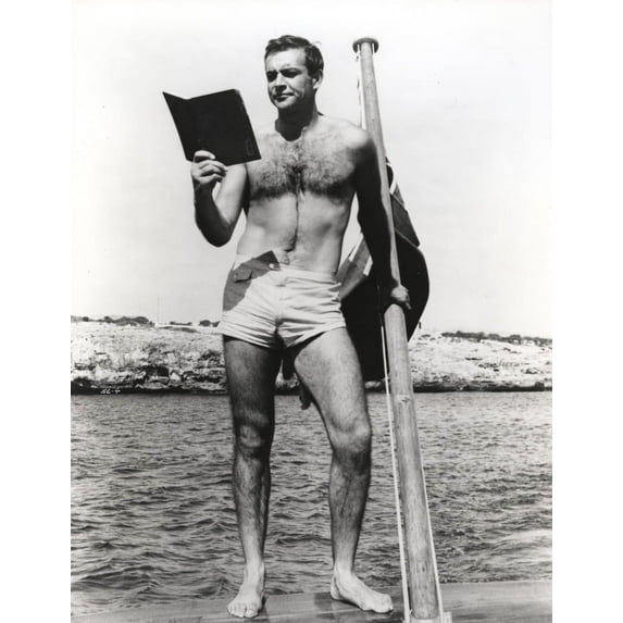 Sean Connery reading by the sea Photo Print (8 x 10)